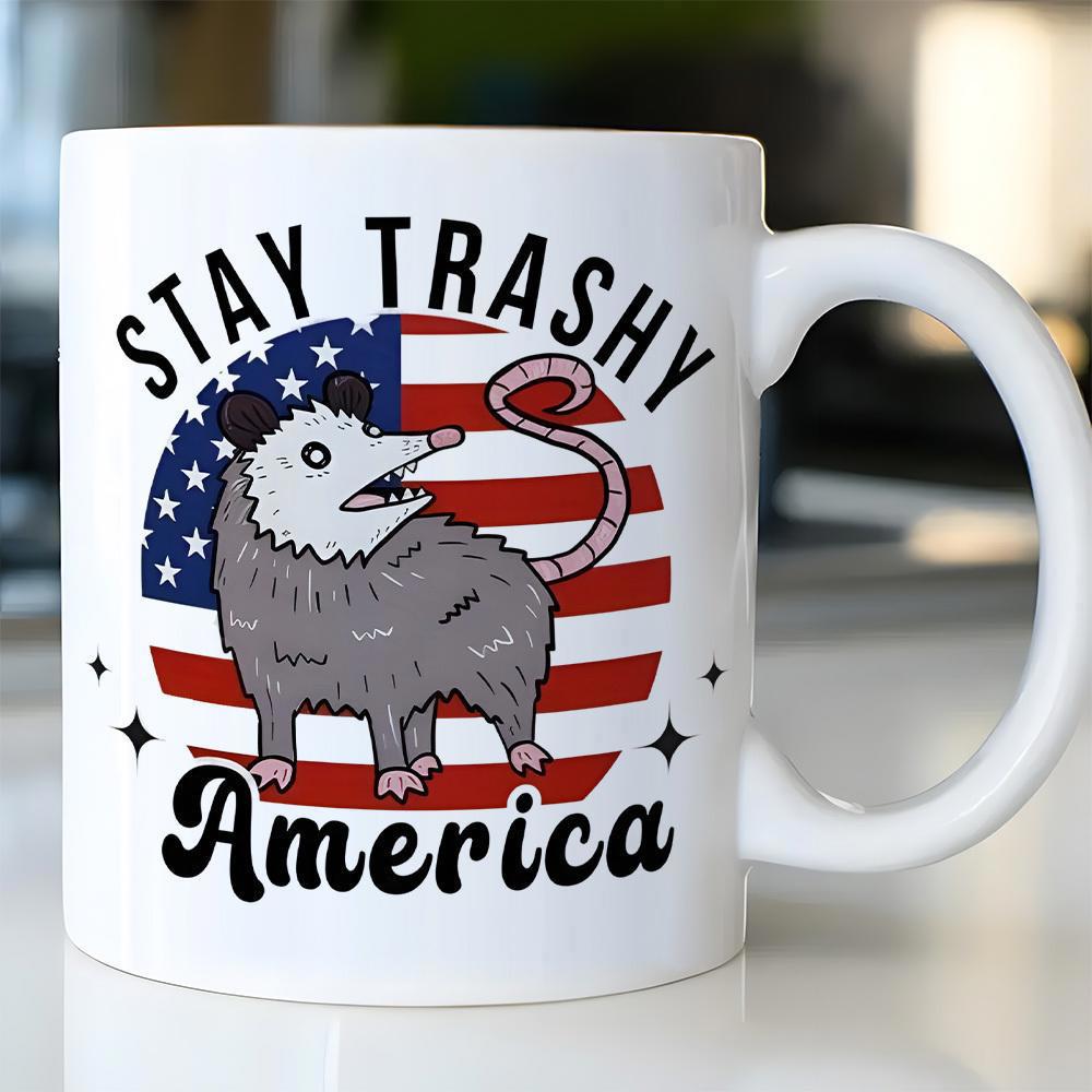 Tailorly White Ceramic 11 oz Mug - Stay Trashy America Grinning Cartoon Opossum Standing Before A Circular American Flag Background Opossum