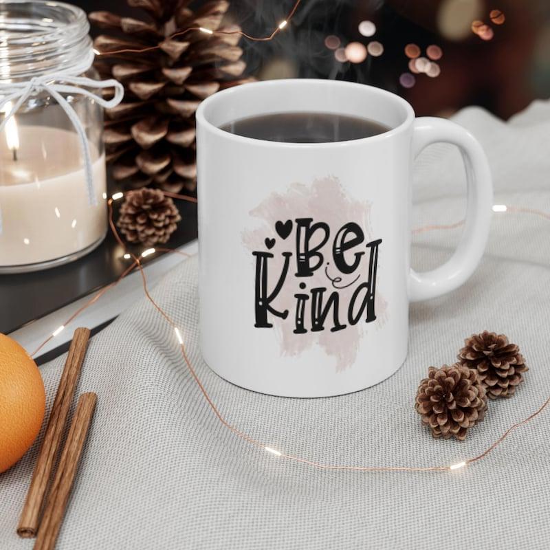 Tailorly White Ceramic 11 oz Mug - Be Kind Decorative Black Font Styled With Soft Pink Watercolor Splash Elements Lettering