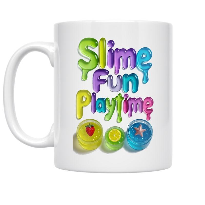 Tailorly White Ceramic 11 oz Mug - Slime Fun Playtime Colorful 3D Dripping Bubble Letters Above Fruity Jelly Containers Under Bright Lighting Slime
