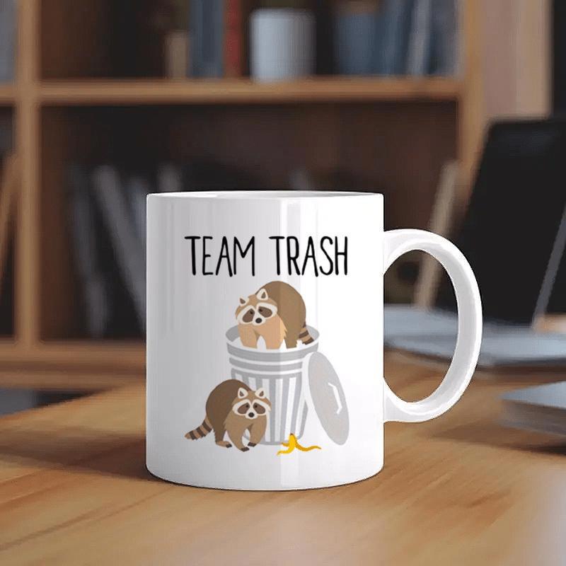 Tailorly White Ceramic 11 oz Mug - Team Trash Cute Raccoons Playing In A Metal Garbage Can With Banana Peel Raccoon