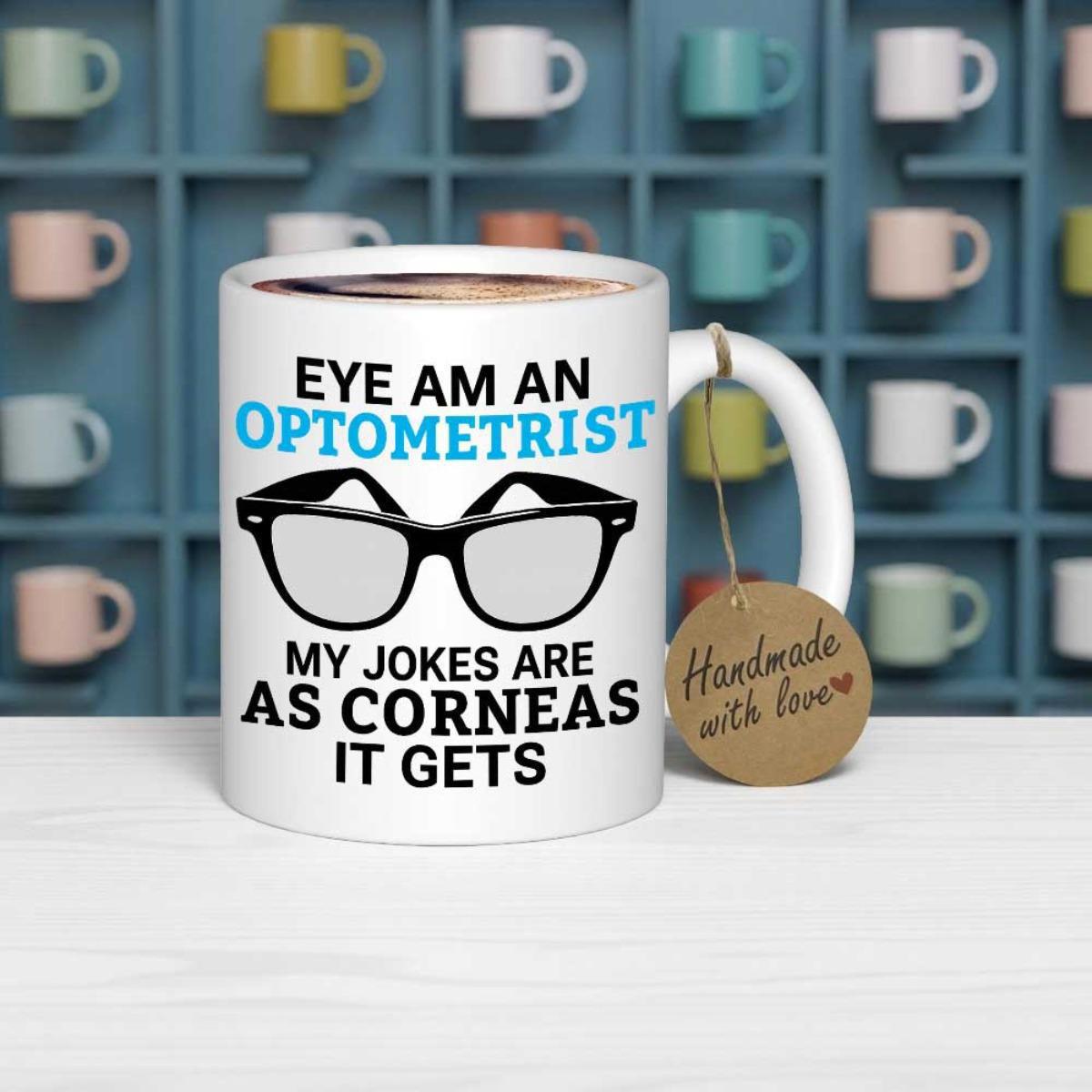 Tailorly White Ceramic 11 oz Mug - Eye Am An Optometrist My Jokes Are As Corneas It Gets Iconic Black Rimmed Eyeglasses Centered Between Bold Blue And Black
