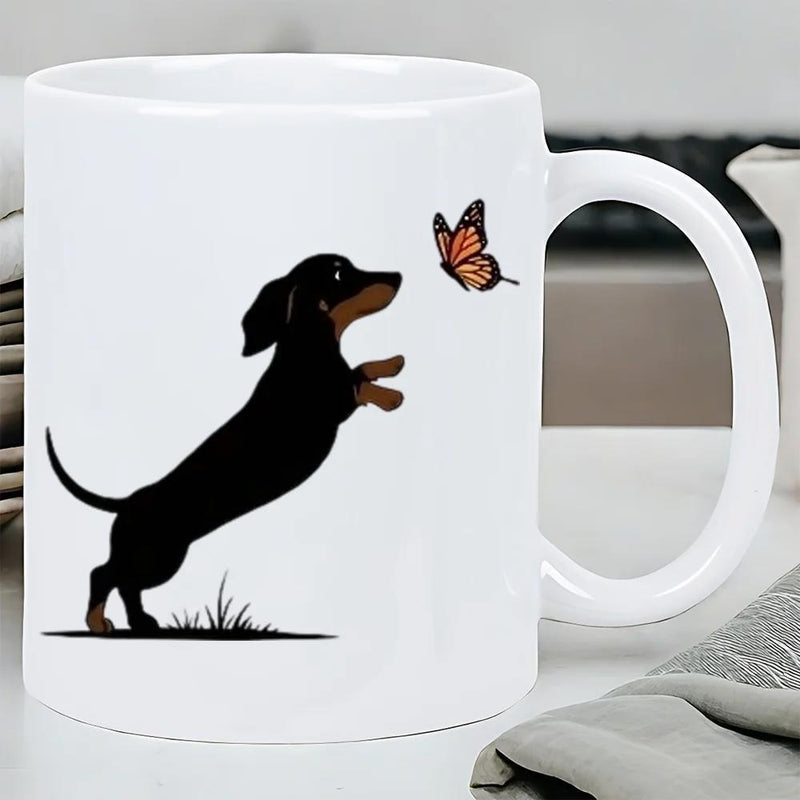 Tailorly White Ceramic 11 oz Mug - Playful Black And Tan Dog Jumping Towards A Flying Orange Butterfly Dachshund