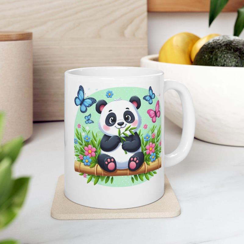 Tailorly White Ceramic 11 oz Mug - Adorable Little Character Eating Bamboo Surrounded By Blooming Flowers And Butterflies Panda