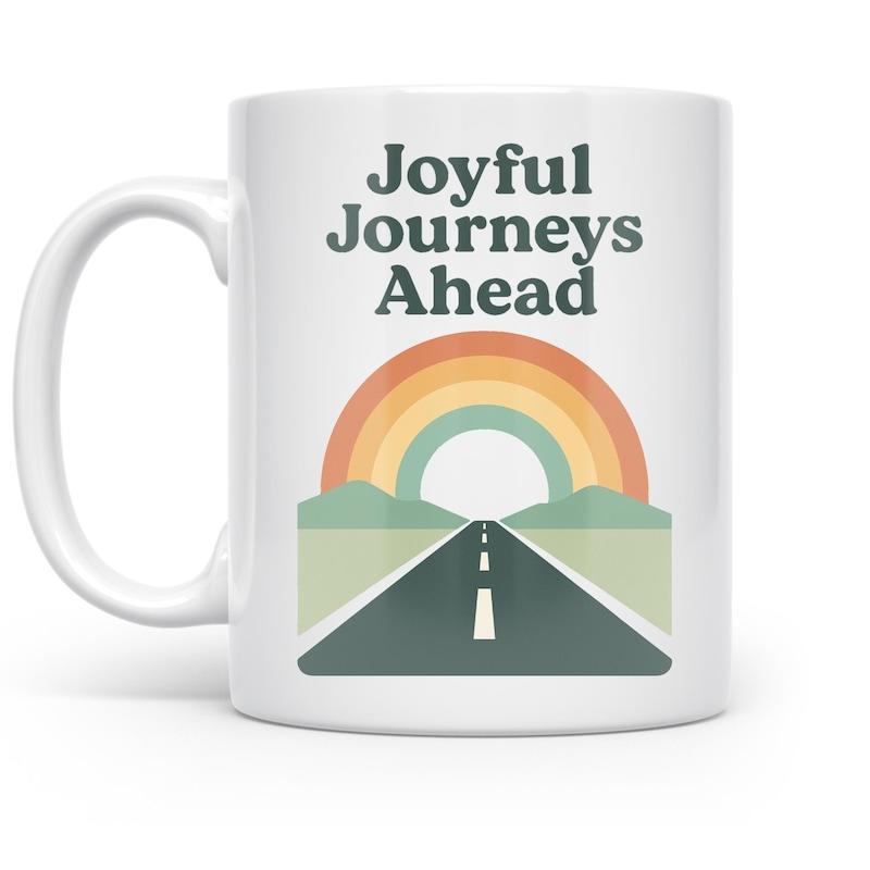 Tailorly White Ceramic 11 oz Mug - Joyful Journeys Ahead Vibrant Retro Rainbow Rising Above A Long Highway Between Green Hills Road