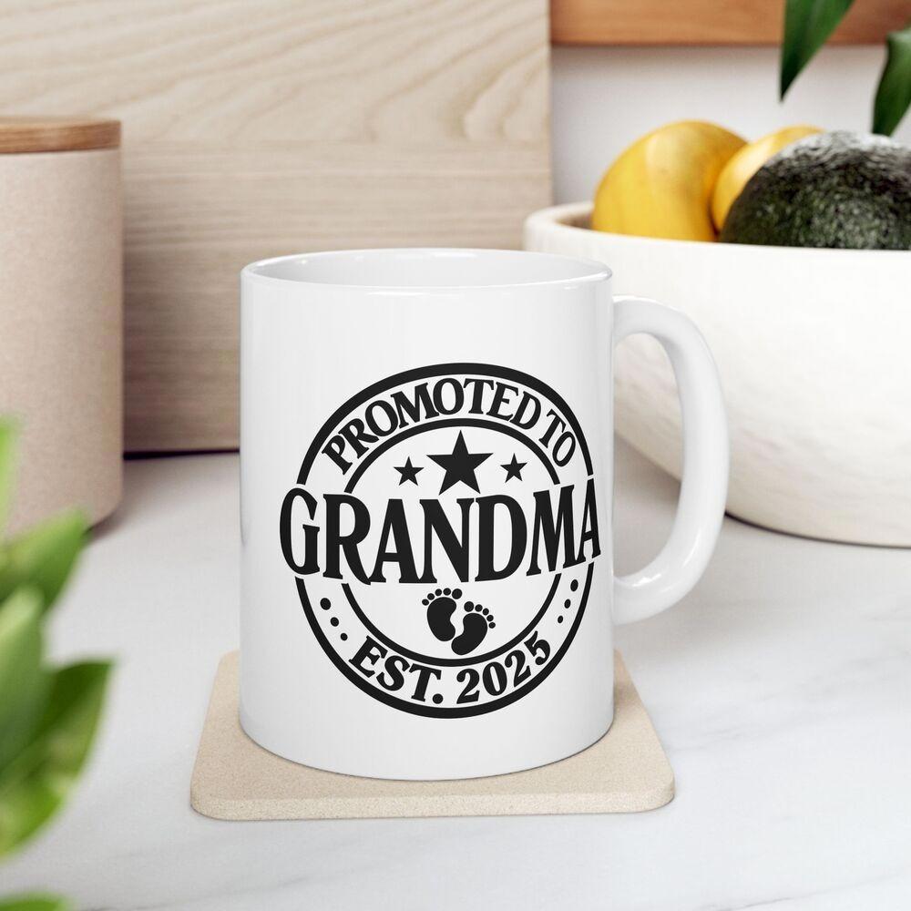 Tailorly White Ceramic 11 oz Mug - Promoted To Grandma Est 2025 Circular Vintage Stamp With Stars And Tiny Baby Footprints Seal