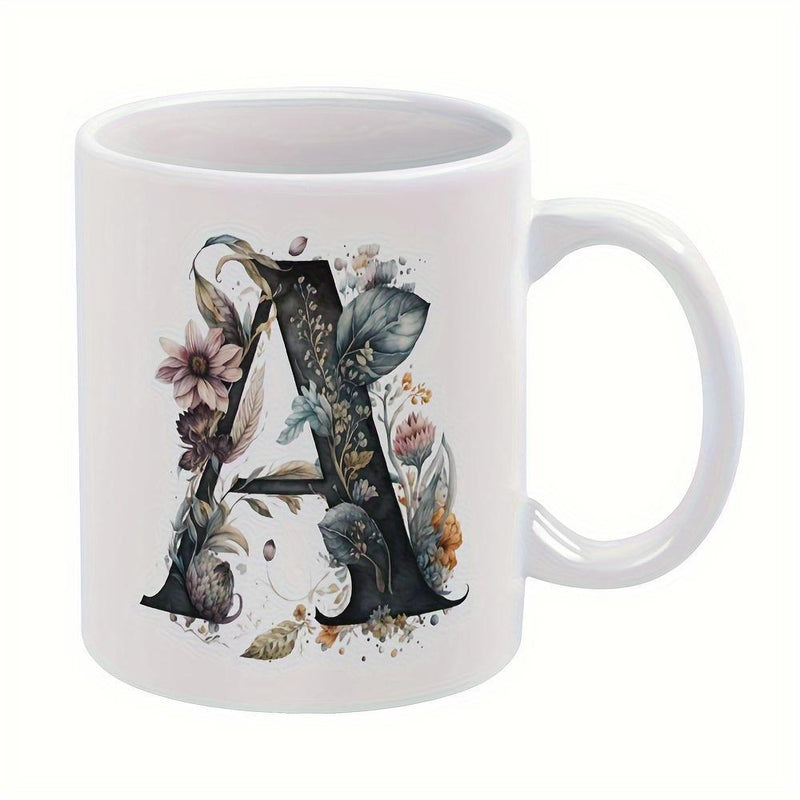 Tailorly White Ceramic 11 oz Mug - A Elegant Serif Style Adorned With Earthy Flowers And Delicate Forest Leaves Letter