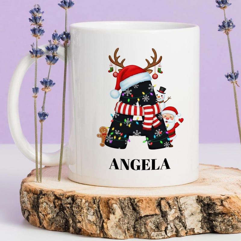 Tailorly White Ceramic 11 oz Mug - Angela Festive Monogram Featuring Reindeer Antlers With Santa Hat And Snowman Alphabet