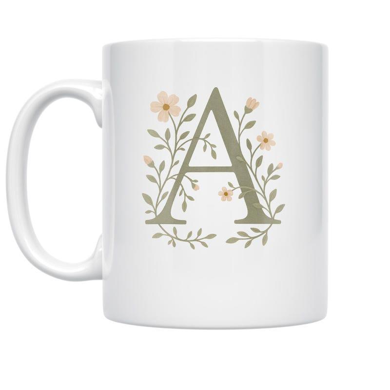 Tailorly White Ceramic 11 oz Mug - A Elegant Serif Letter Surrounded By Delicate Wildflowers And Soft Green Vines Monogram