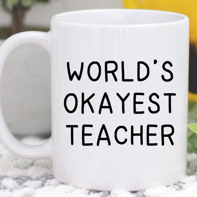 Tailorly White Ceramic 11 oz Mug - Worlds Okayest Teacher Simple Minimalist Typography Featuring Bold Black Letters On A Clean Ceramic Mug