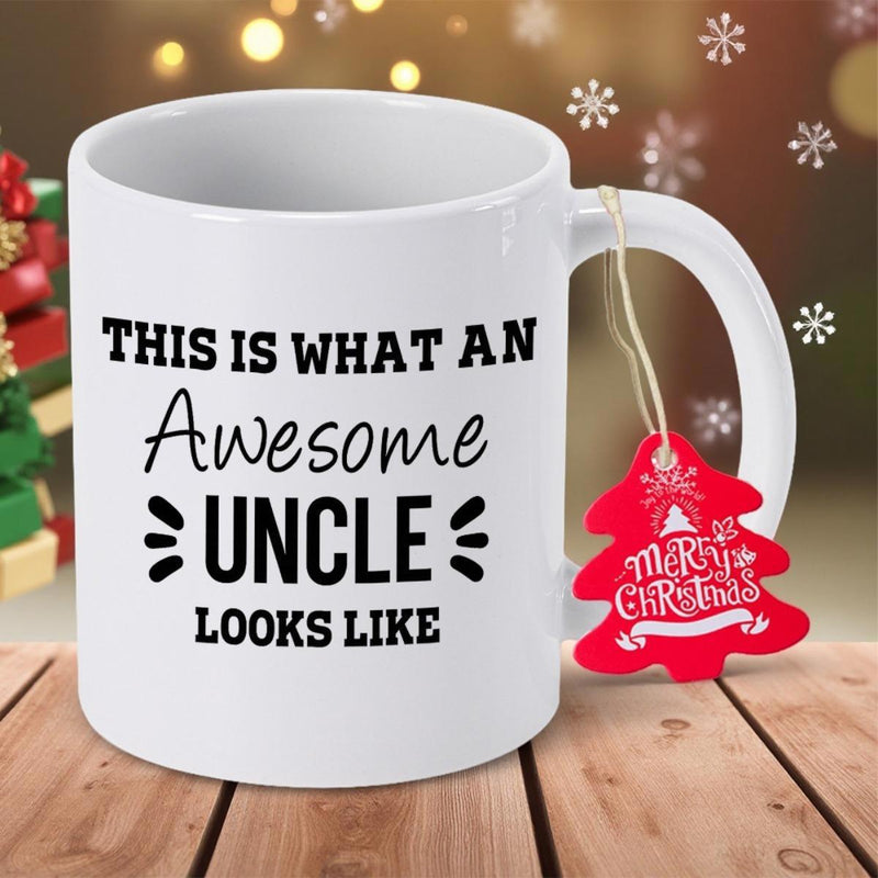Tailorly White Ceramic 11 oz Mug - This Is What An Awesome Uncle Looks Like Merry Christmas Classic White Ceramic Cup Resting On A Polished Wooden Surface Mug