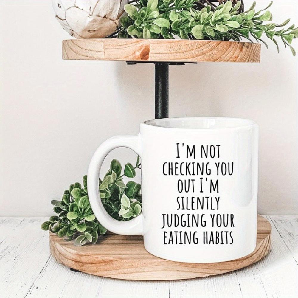 Tailorly White Ceramic 11 oz Mug - Im Not Checking You Out Im Silently Judging Your Eating Habits Minimalist Ceramic Vessel Sitting On Rustic Wood With Green