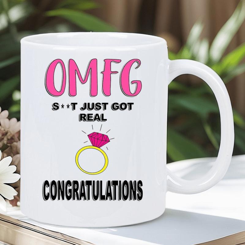 Tailorly White Ceramic 11 oz Mug - Omfg Shit Just Got Real Congratulations Sparkling Golden Band With Radiant Pink Gemstone Celebrating Love Engagement Ring