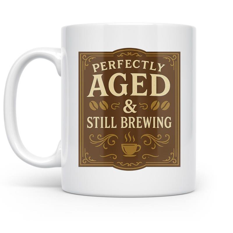 Tailorly White Ceramic 11 oz Mug - Perfectly Aged Still Brewing Vintage Styled Brown Frame With Elegant Decorative Swirls And Small Label