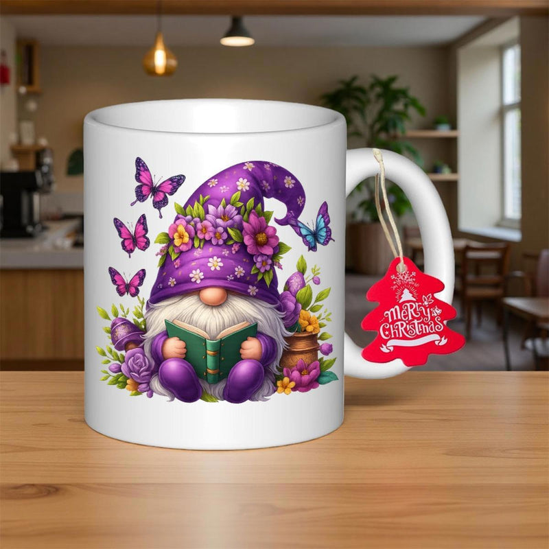 Tailorly White Ceramic 11 oz Mug - Merry Christmas Whimsical Garden Wearing Purple Floral Hat Reading Green Book Surrounded By Butterflies Gnome