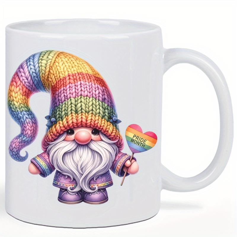 Tailorly White Ceramic 11 oz Mug - Pride Adorable Knitted Texture Wearing Vibrant Rainbow Hat Holding A Heart Gnome