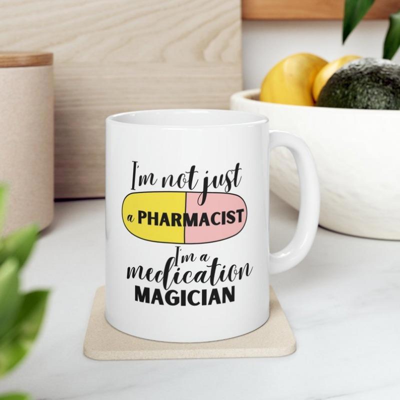 Tailorly White Ceramic 11 oz Mug - Im Not Just A Pharmacist Im A Medication Magician Yellow And Pink Medicine Pill Centered Within Professional Typography Capsule
