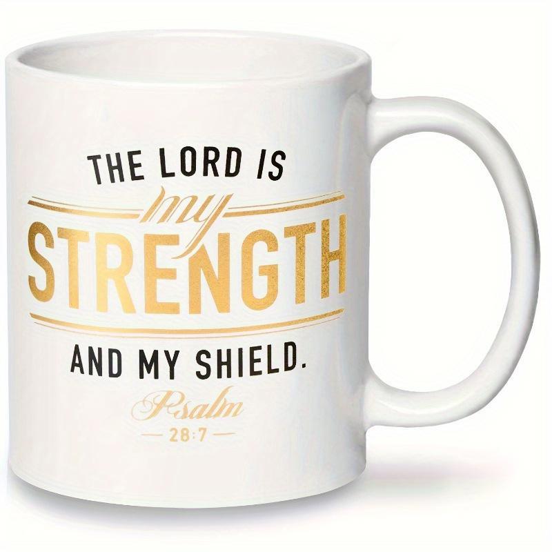 Tailorly White Ceramic 11 oz Mug - The Lord Is My Strength And My Shield Psalm Golden Script Typography With Elegant Horizontal Lines On Clean White Surface Mug