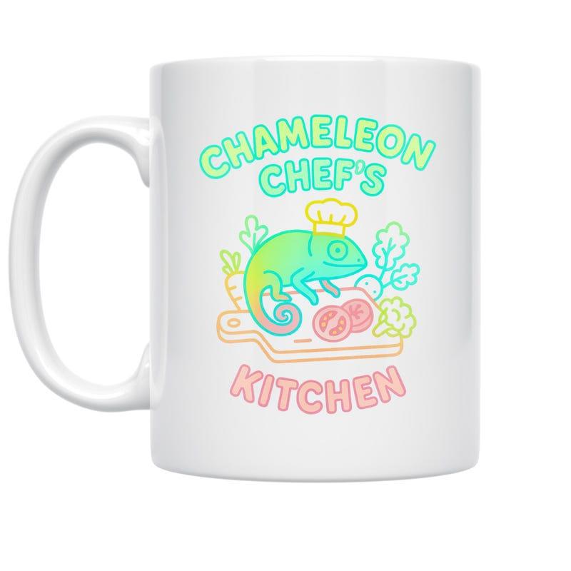 Tailorly White Ceramic 11 oz Mug - Chameleon Chef's Kitchen Vibrant Lizard Wearing A Hat Preparing Fresh Ingredients On A Board Chameleon