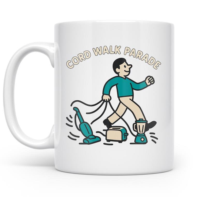 Tailorly White Ceramic 11 oz Mug - Cord Walk Parade Happy Cartoon Man Leading Household Appliances In A Fun Marching Parade
