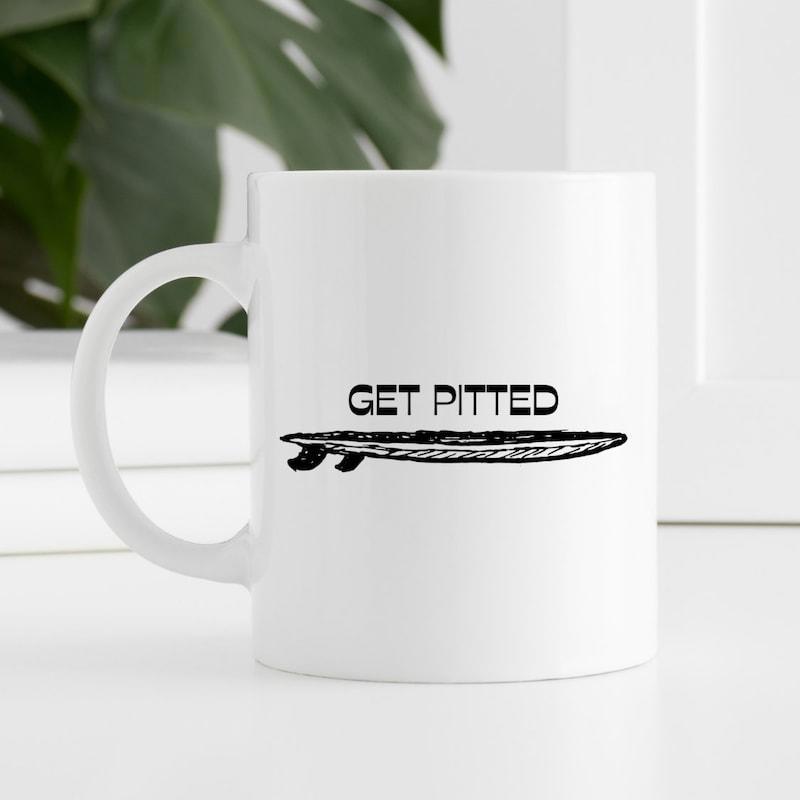 Tailorly White Ceramic 11 oz Mug - Get Pitted Minimalist Black Surfboard Silhouette Featuring Sleek Lines And Rustic Texture Surfboard
