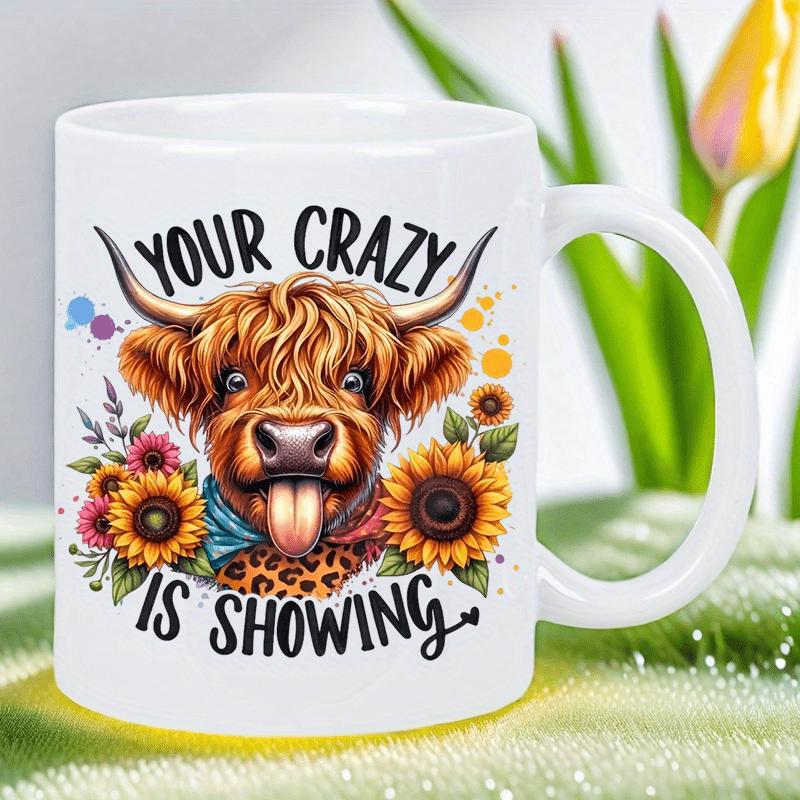 Tailorly White Ceramic 11 oz Mug - Your Crazy Is Showing Shaggy Highland Cow Sticking Tongue Out Amidst Sunflowers Cow