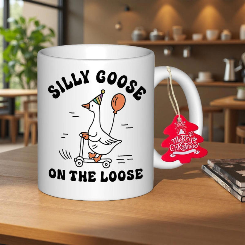 Tailorly White Ceramic 11 oz Mug - Silly Goose On The Loose Playful Cartoon Wearing Party Hat Riding A Small Kick Scooter Holding Balloon Goose