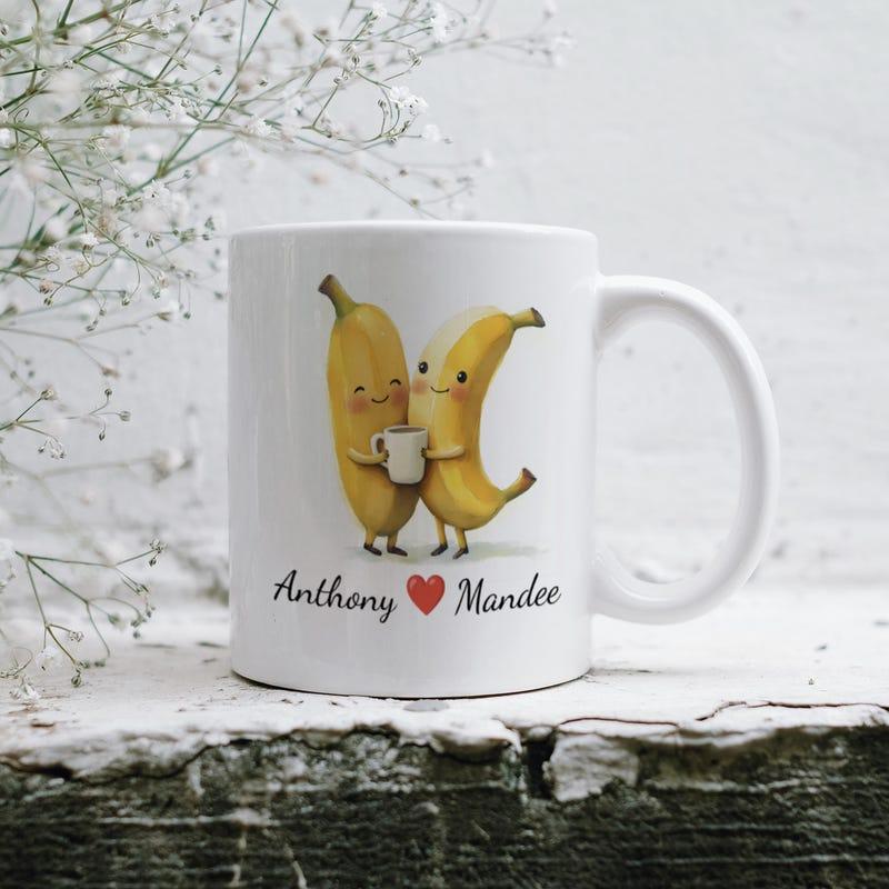 Tailorly White Ceramic 11 oz Mug - Anthony Mandee Adorable Cuddling Fruit Characters Sharing A Warm Cup Of Coffee Banana