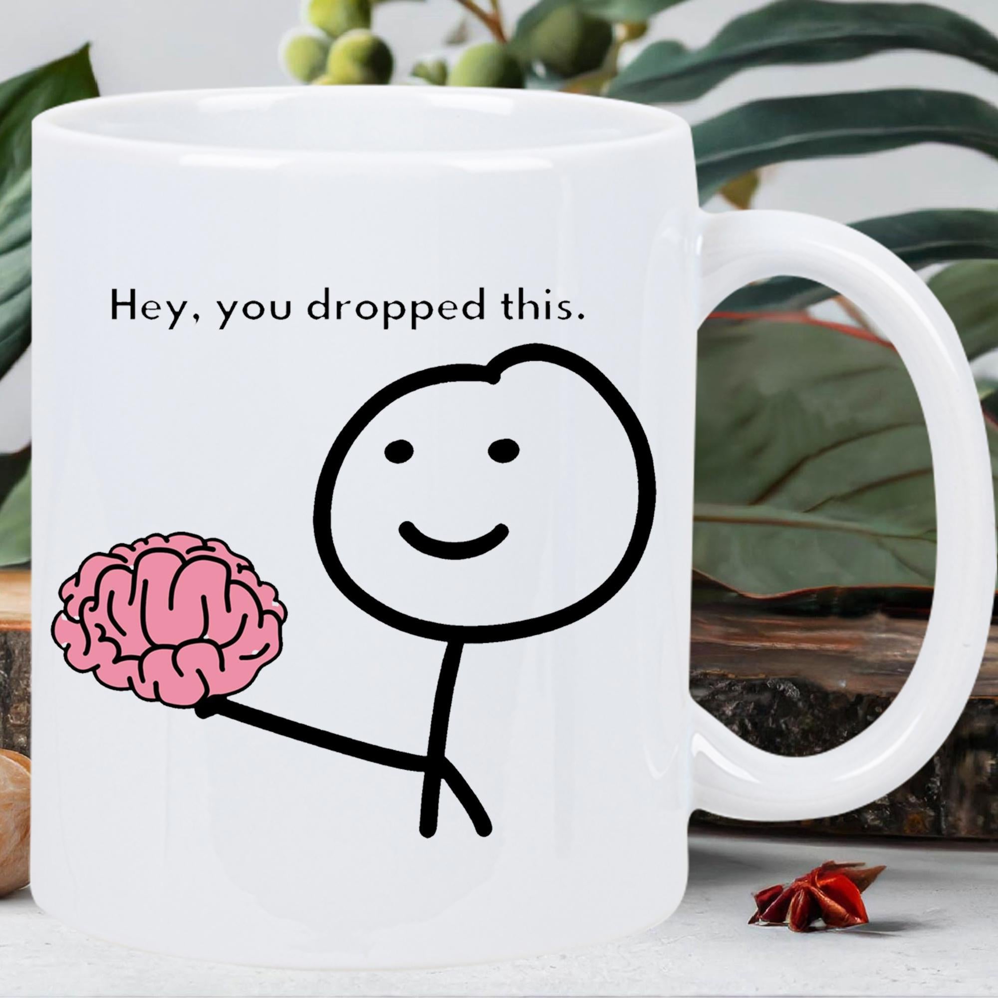 Tailorly White Ceramic 11 oz Mug - Hey You Dropped This Minimalist Black Outline Stickman Holding A Detailed Pink Human Anatomical Brain