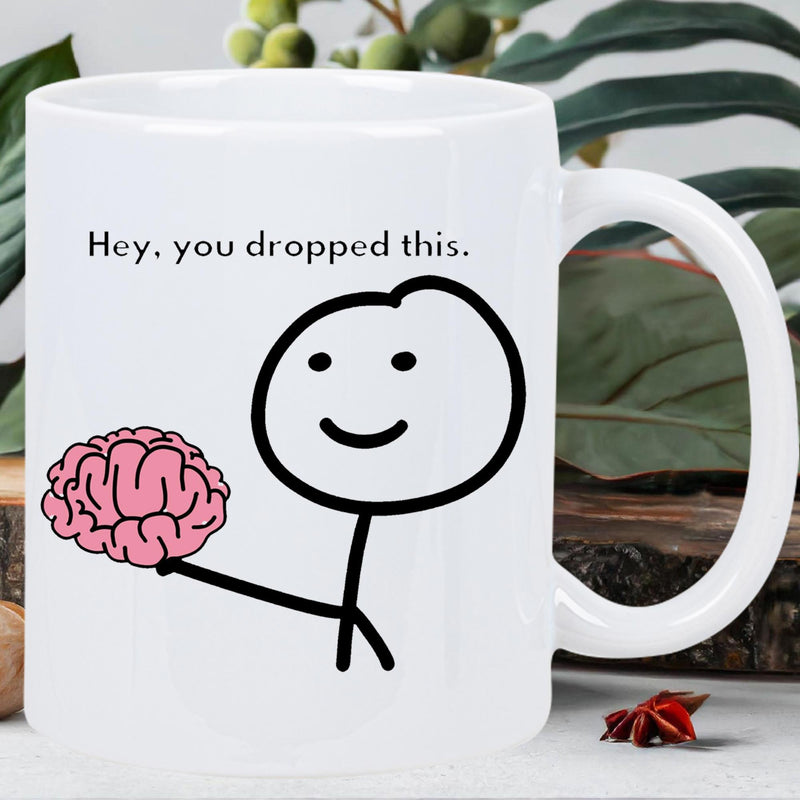 Tailorly White Ceramic 11 oz Mug - Hey You Dropped This Minimalist Black Outline Stickman Holding A Detailed Pink Human Anatomical Brain