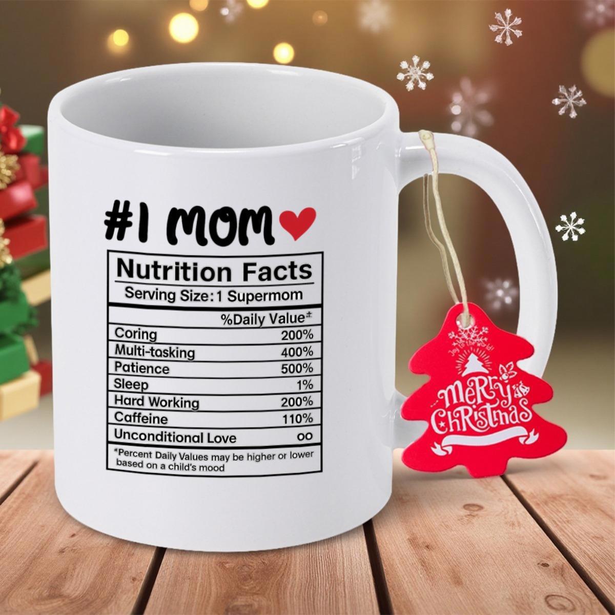 Tailorly White Ceramic 11 oz Mug - Number One Mom Nutrition Facts Serving Size One Supermom Glossy White Surface Displaying Elegant Black Table With Vibrant Heart