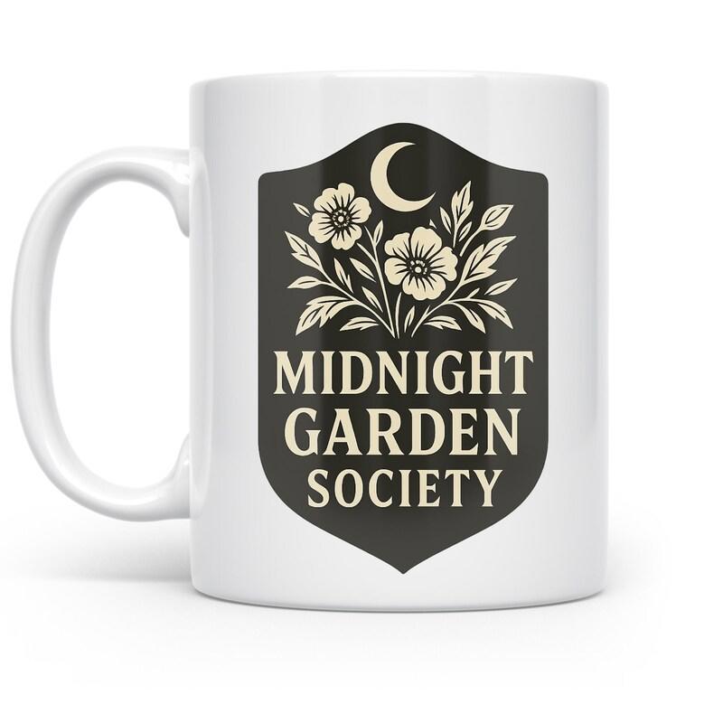Tailorly White Ceramic 11 oz Mug - Midnight Garden Society Elegant Crescent Moon Rising Above Blooming Wildflowers Inside A Vintage Shield Flower