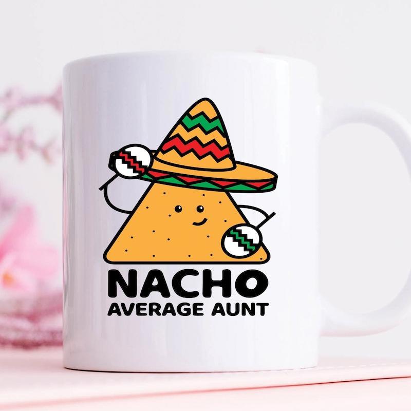 Tailorly White Ceramic 11 oz Mug - Nacho Average Aunt Smiling Cartoon Tortilla Chip Wearing Colorful Sombrero Shaking Maracas Nacho