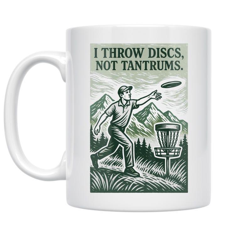 Tailorly White Ceramic 11 oz Mug - I Throw Discs Not Tantrums Athletic Man Throwing Toward Target Basket Among Majestic Forest Mountains Disc