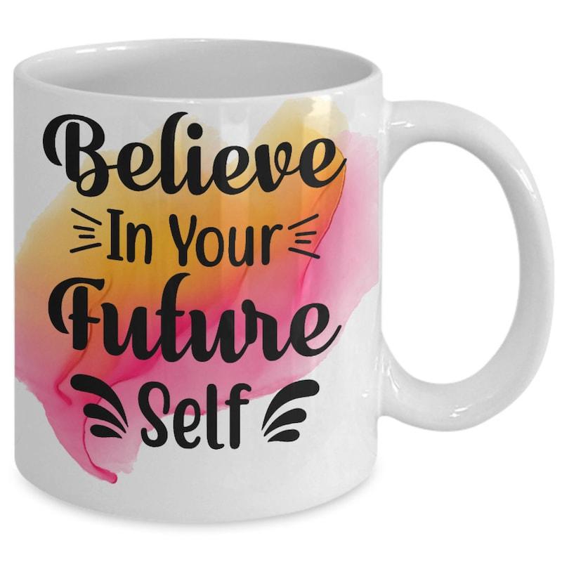 Tailorly White Ceramic 11 oz Mug - Believe In Your Future Self Vibrant Abstract Watercolor Splash Using Warm Pink And Yellow Tones Mug