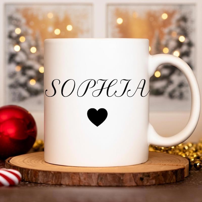 Tailorly White Ceramic 11 oz Mug - Sophia Minimalist Black Icon Centered On A Smooth Polished White Ceramic Heart