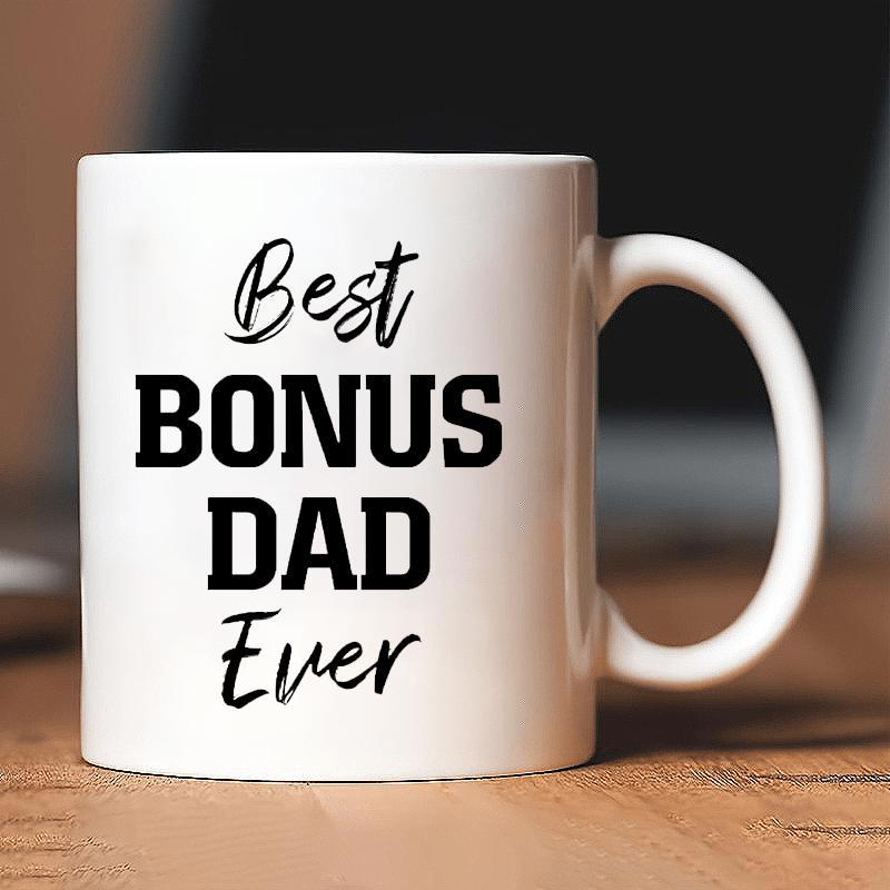 Tailorly White Ceramic 11 oz Mug - Best Bonus Dad Ever Simple Bold Black Typography Centered On A Glossy White Surface Mug
