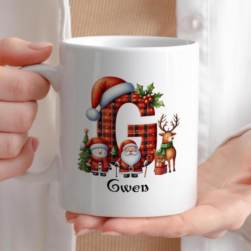 Tailorly White Ceramic 11 oz Mug - Gwen Festive Red Plaid Pattern Featuring Santa Reindeer And Trees Letter