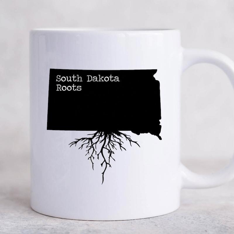 Tailorly White Ceramic 11 oz Mug - South Dakota Roots Solid Black State Silhouette With Intricate Roots Spreading Beneath Map