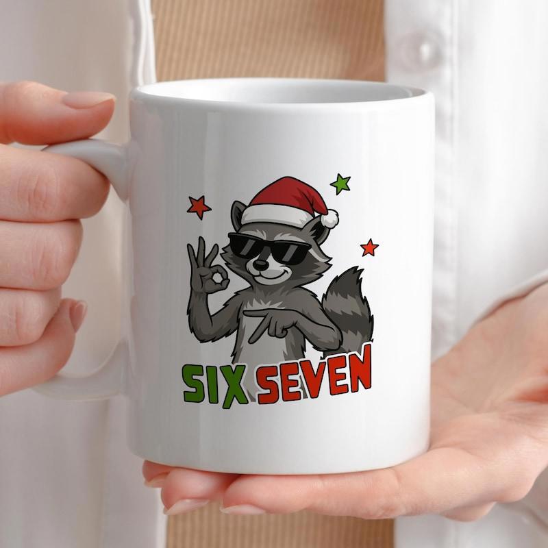 Tailorly White Ceramic 11 oz Mug - Six Seven Wearing Festive Santa Hat And Sunglasses Among Sparkling Little Stars Raccoon