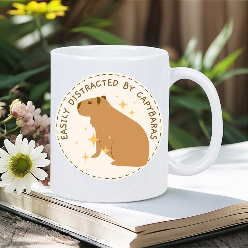 Tailorly White Ceramic 11 oz Mug - Easily Distracted By Capybaras Cute Golden Brown Cartoon Animal Sitting With Sparkling Twinkling Stars Among Capybara