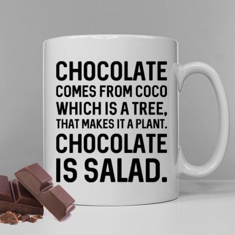 Tailorly White Ceramic 11 oz Mug - Chocolate Comes From Coco Which Is A Tree That Makes It A Plant Chocolate Is Salad Bold Black Typographic Design On White