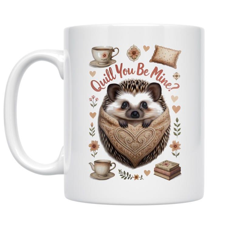 Tailorly White Ceramic 11 oz Mug - Quill You Be Mine Charming Animal Wrapped In Cozy Patterned Blanket Among Warm Tea Accessories Hedgehog