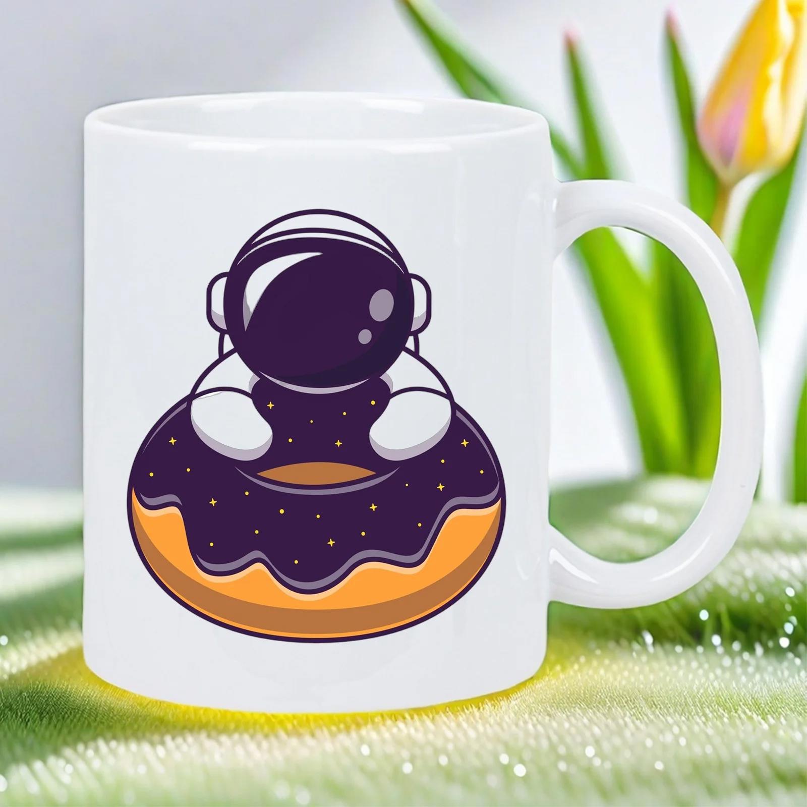 Tailorly White Ceramic 11 oz Mug - Adorable Cartoon Spaceman Floating Behind A Large Frosted Delicious Chocolate Doughnut Astronaut
