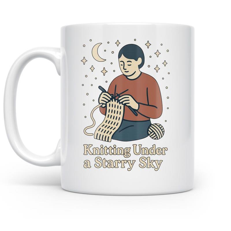 Tailorly White Ceramic 11 oz Mug - Knitting Under A Starry Sky Peaceful Figure Creating Warm Garments Beneath A Glimmering Moonlit Night Knitter