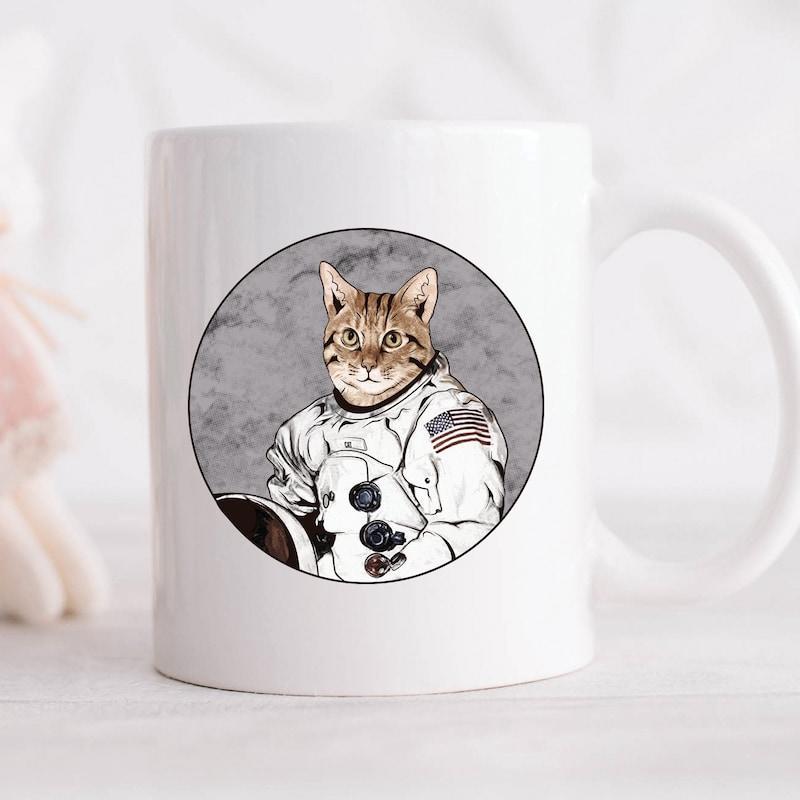 Tailorly White Ceramic 11 oz Mug - Whimsical Tabby Cat Astronaut Wearing Detailed Space Suit Exploring Celestial Galaxy Cat