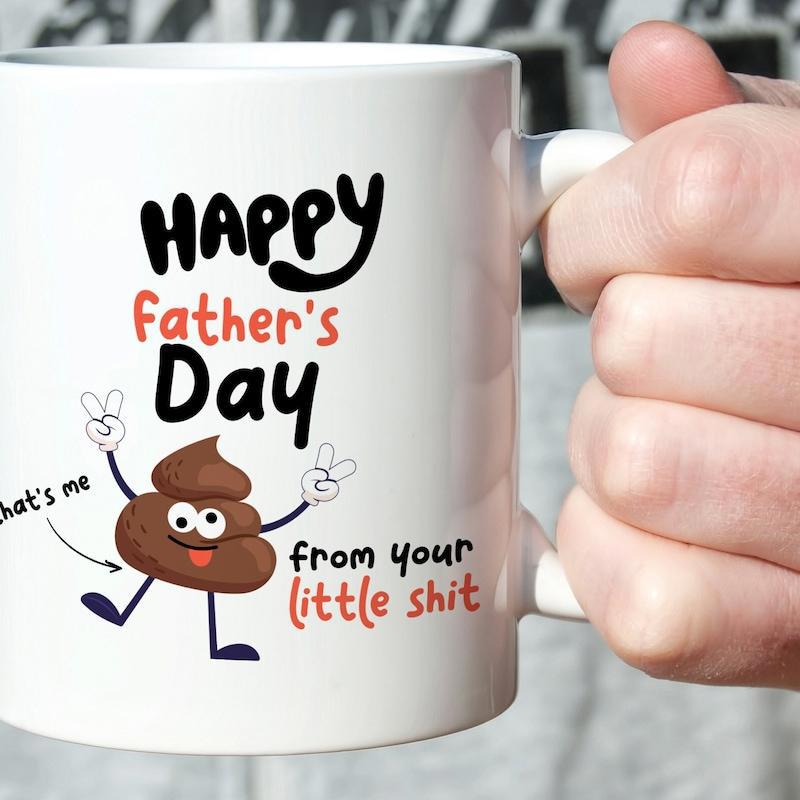 Tailorly White Ceramic 11 oz Mug - Happy Father's Day That's Me From Your Little Shit Playful Cartoon Emoji Character Showing Victory Signs Smiling Poop