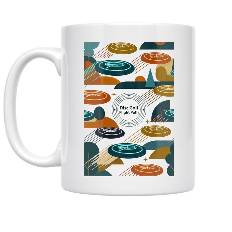 Tailorly White Ceramic 11 oz Mug - Disc Golf Flight Path Colorful Abstract Flying Discs Gliding Through Minimalist Geometric Mid Century Modern Path Disc