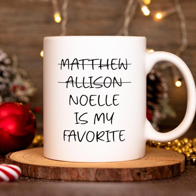 Tailorly White Ceramic 11 oz Mug - Matthew Allison Noelle Is My Favorite White Ceramic Minimalist Surface With Crossed Out Sibling Names Mug