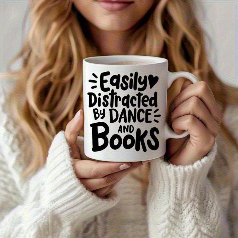 Tailorly White Ceramic 11 oz Mug - Easily Distracted By Dance And Books Minimalist White Ceramic Held By Hands With Artistic Lettering Heart Mug