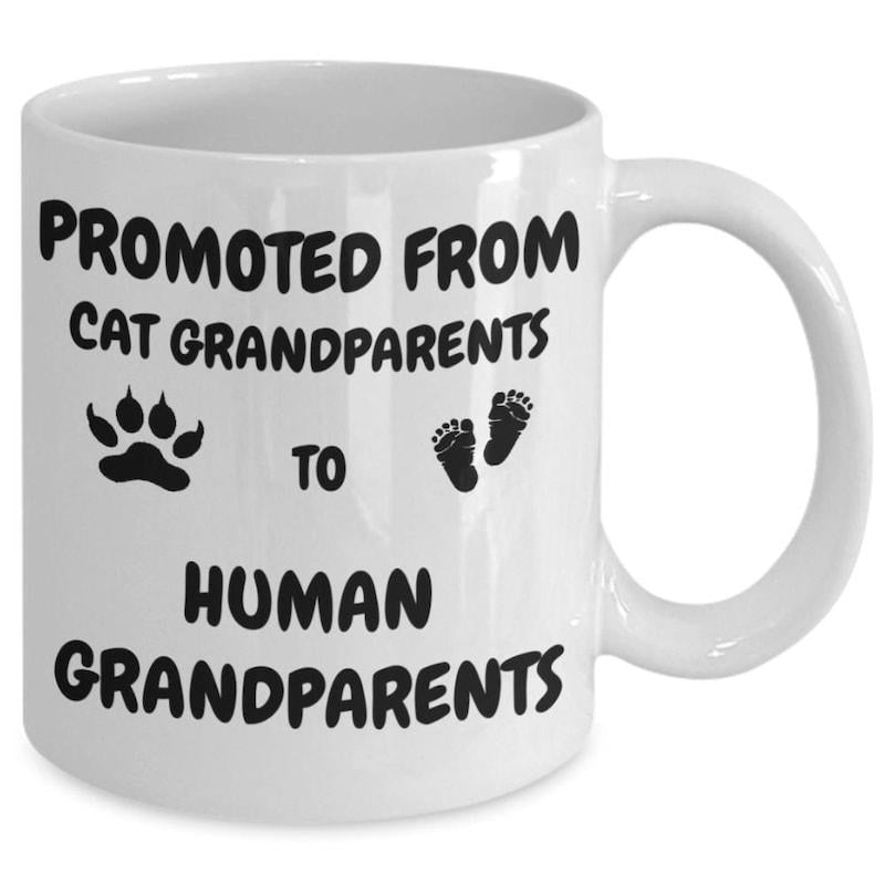 Tailorly White Ceramic 11 oz Mug - Promoted From Cat Grandparents To Human Grandparents Minimalist Black Paw And Infant Footprints Centered On A